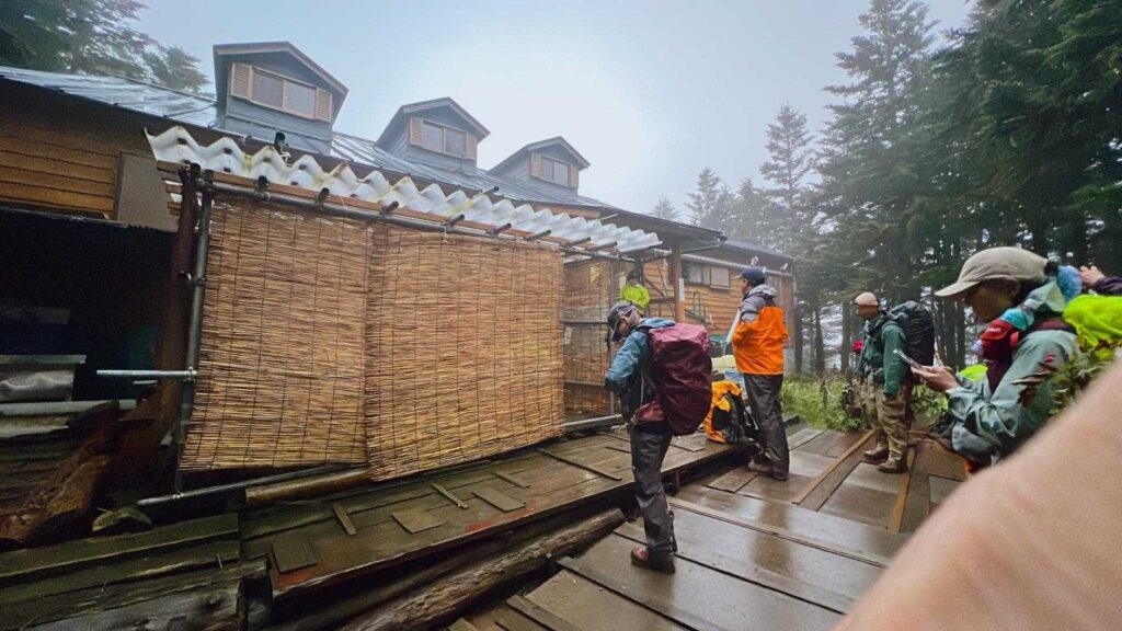 雨の中の撤退判断